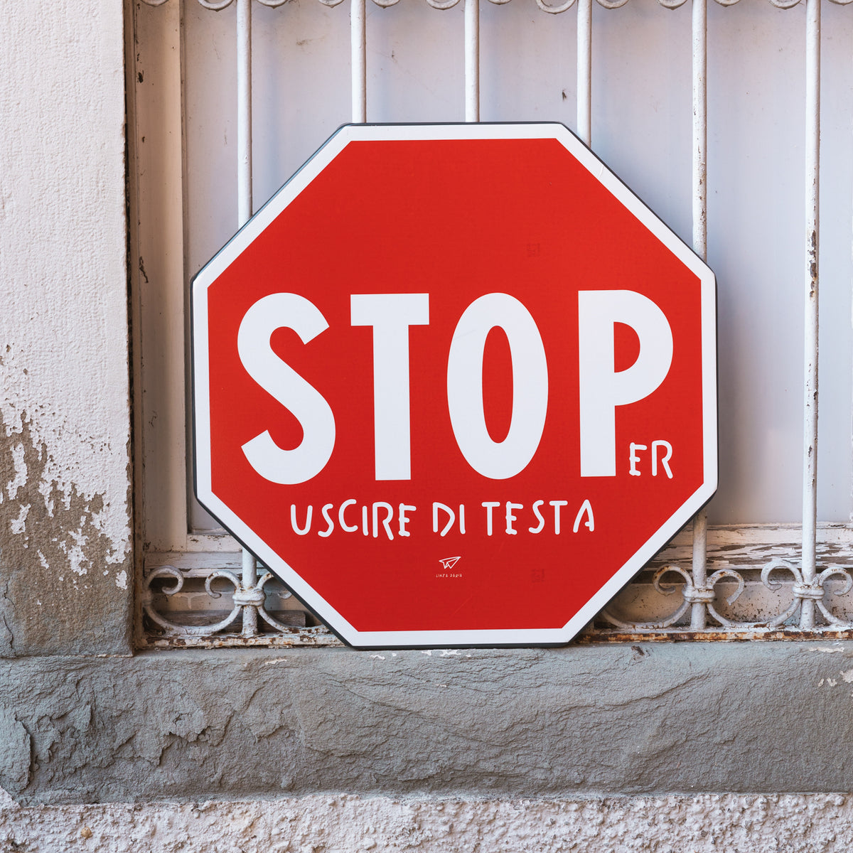 Cartello stoPer uscire di testa